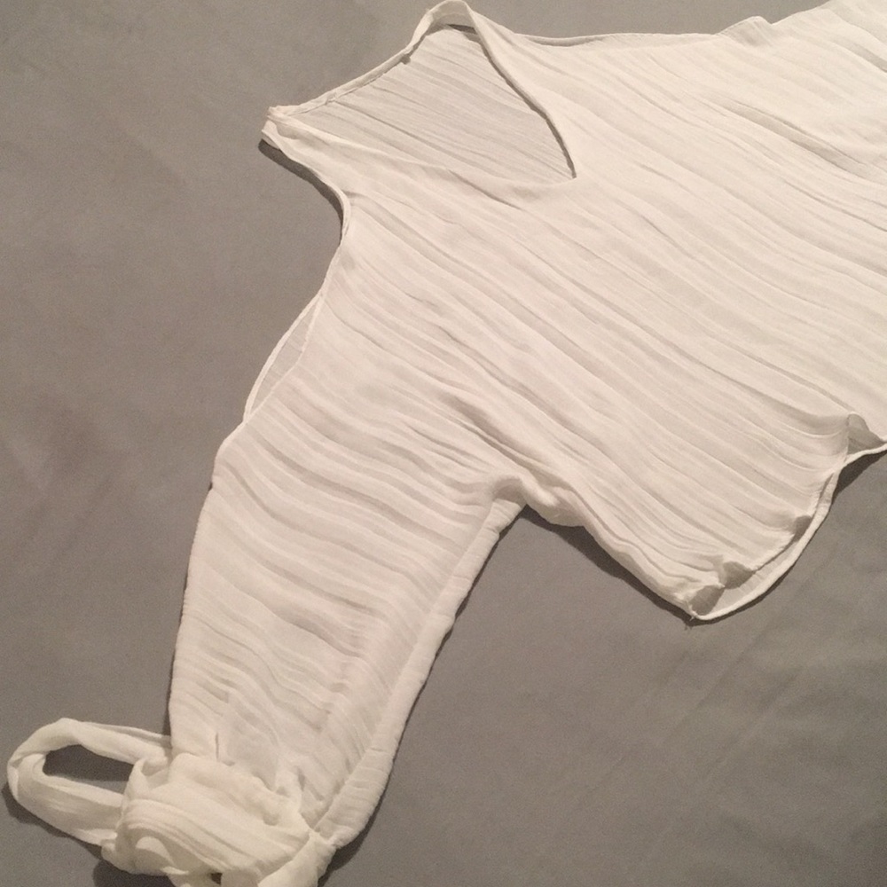 White long sleeve shoulder cut blouse